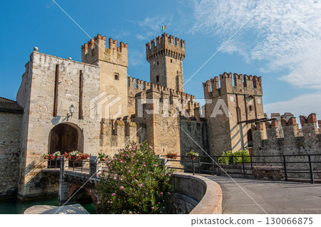 Sirmione Castle Fortress on Lago di Garda with Tourists Exploring Ancient Battlements 130066875