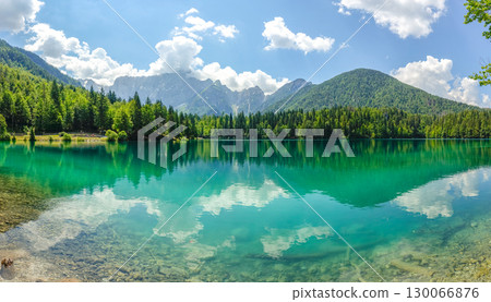 Fusine Lakes Pristine Turquoise Waters Reflecting Julian Alps in Friuli Venezia Giulia Italy 130066876
