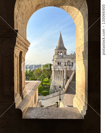 Ancient Stone Archway Frames Historic Fishermans Bastion Tower in Budapest Hungary 130066900
