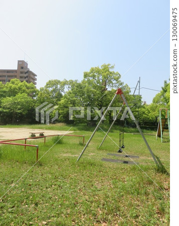 Swing in the park 130069475