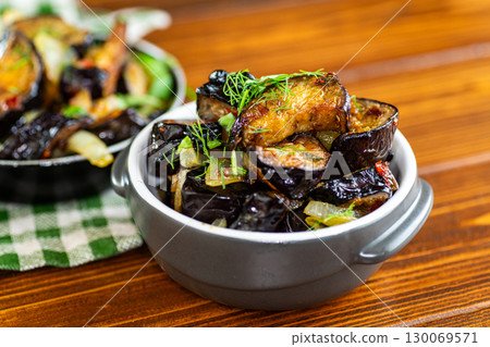 A juicy and aromatic dish of fresh vegetables with herbs A juicy and aromatic dish of fresh vegetables with herbs 130069571