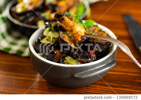 A juicy and aromatic dish of fresh vegetables with herbs 130069572