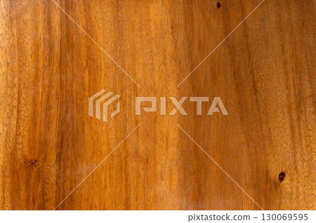 Wooden panel background with black spot 130069595