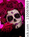 Portrait of Girl With Calavera Makeup and Roses for Dia De Muertos 130069669