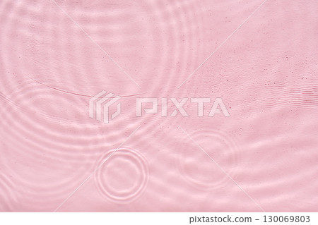 Abstract pink water background with streaks of water. Abstract pink water background with streaks of water. 130069803