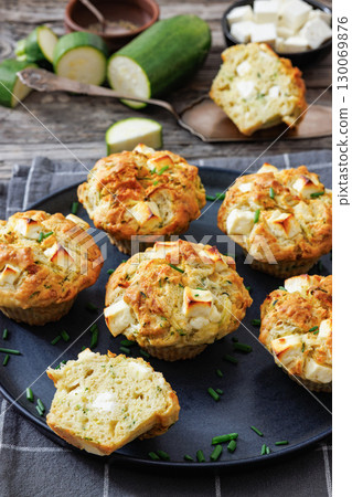 Greek Style Zucchini Feta Muffins, top view 130069876
