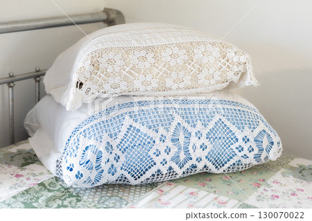 Crocheted pillowcases on an iron bed in the USSR 130070022