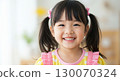 Portrait of a cute girl smiling happily with sparkling eyes 130070324