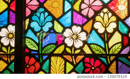 Botanical stained glass background of colorful flowers and plants that transmit light 130070329