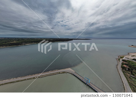 Aerial panorama view of a small drawbridge. Antenal, Istria, Croatia. 130071041