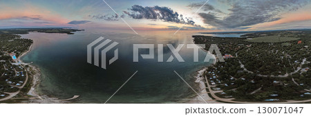 Aerial panorama drone sunset view of Lanterna peninsula, Istria, Croatia. Aerial panorama drone sunset view of Lanterna peninsula, Istria, Croatia. 130071047