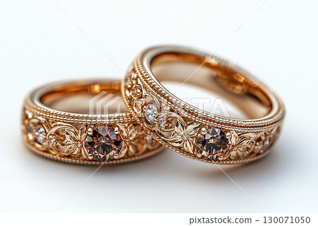 Luxury pair of Wedding Rings on a white background. Rococo Renaissance style. 130071050