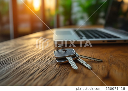 Keys On The Table With Laptop 130071416