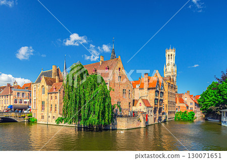 Bruges cityscape, Brugge old town scenic view quarter historical city centre, Rosary Quay Rozenhoedkaai embankment, Belfort Belfry tower, Dijver water canal of Reie river, Flemish Region, Belgium 130071651