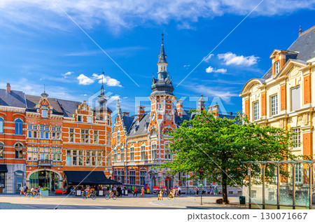 Old Post Office House Leuven brick building in Leuven city historical center in sunny summer day, Flemish Region, Flemish Brabant province, Belgium 130071667