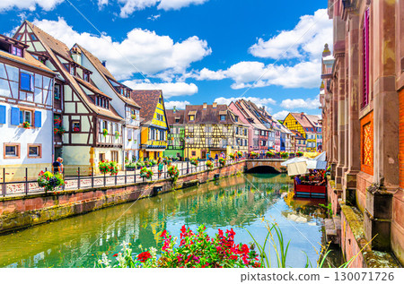 Little Venice la Petite Venise in old town Colmar city historic centre with old colorful houses medieval buildings on Quai de la Poissonnerie of river Lauch canal, Alsace Grand Est region, France 130071726