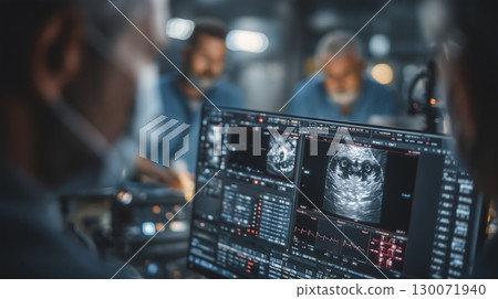 Medical professionals conduct an ultrasound scan in a modern healthcare setting Medical professionals conduct an ultrasound scan in a modern healthcare setting 130071940