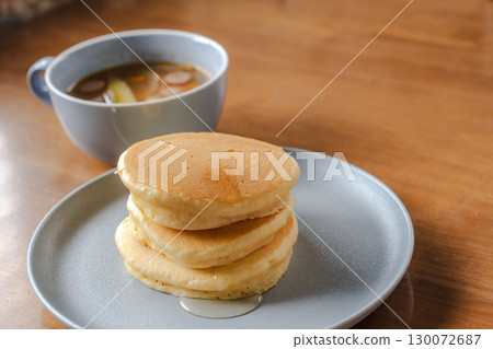 Western-style breakfast of pancakes and syrup with sausage soup Western-style breakfast of pancakes and syrup with sausage soup 130072687