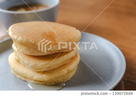 Western-style breakfast of pancakes and syrup with sausage soup 130072689