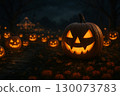A Halloween scene with jack-o'-lanterns shining fantastically in the forest at night 130073783