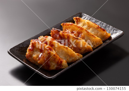 Fried dumplings with yangnyeom sauce Fried dumplings with yangnyeom sauce 130074155