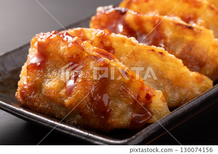 Fried dumplings with yangnyeom sauce 130074156