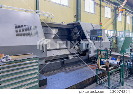 A factory lined with machine tools A factory lined with machine tools 130074264