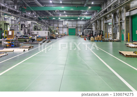 A factory lined with machine tools A factory lined with machine tools 130074275