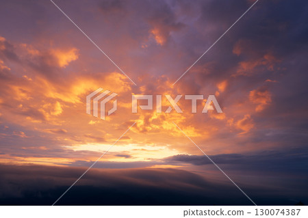 Dawn in the clouds Dawn in the clouds 130074387