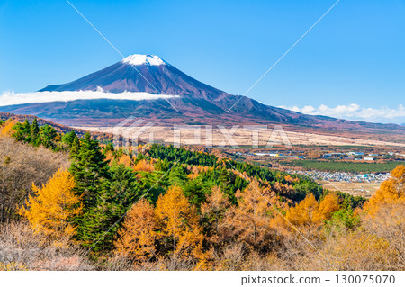 Mount Fuji seen from Nijumagari Pass in autumn colors in Yamanashi 130075070
