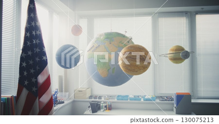 American Primary School: Interior of Modern Classroom with Hanging Models of Solar System American Primary School: Interior of Modern Classroom with Hanging Models of Solar System 130075213