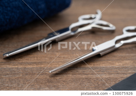 Close-up of haircutting scissors and thinning shears Close-up of haircutting scissors and thinning shears 130075926