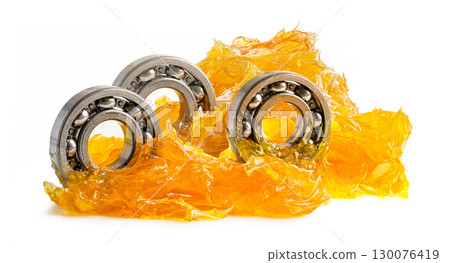 Ball bearing stainless with grease lithium machinery lubrication for automotive and industrial isolated on white background. Ball bearing stainless with grease lithium machinery lubrication for automotive and industrial isolated on white background. 130076419