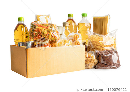 Foodstuff for donation isolated on white background, storage and delivery. Various food, pasta, cooking oil and canned food. Foodstuff for donation isolated on white background, storage and delivery. Various food, pasta, cooking oil and canned food. 130076421
