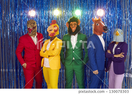 Portrait of friends in animal masks standing on shiny background 130078303