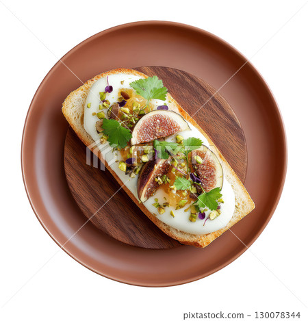 Smooth Foie Gras Mousse Canape on Crisp Brioche with Fig Gel and Crushed Pistachios Garnish 130078344