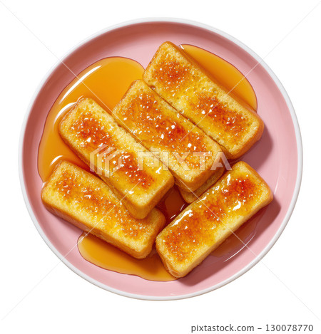 Deliciously Golden Sweet Dessert with Maple Syrup on a Pink Plate Perfect for Tasty Treats and Culinary Inspiration Deliciously Golden Sweet Dessert with Maple Syrup on a Pink Plate Perfect for Tasty Treats and Culinary Inspiration 130078770