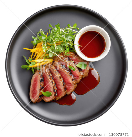 Delicate Seared Wagyu Beef Tataki with Ponzu Sauce and Fresh Garnishes on Elegant Black Plate 130078771