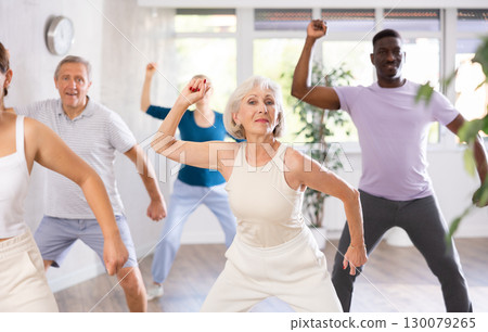 Group of multiethnic mature people dancing modern dance 130079265