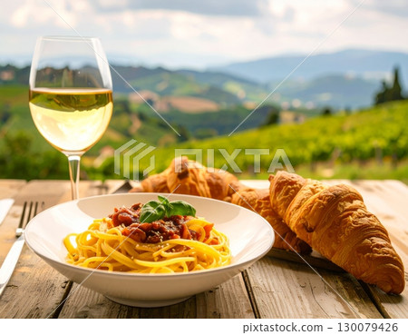 Delicious Italian spaghetti with tomato sauce and basil on a white plate ready for a gourmet dinner 130079426