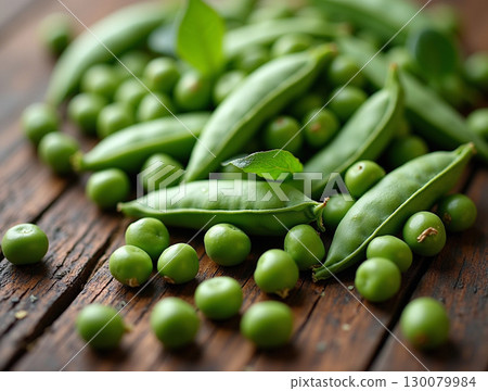 Fresh Bright Green Pea Still Life on Rustic Wood Surface Fresh Bright Green Pea Still Life on Rustic Wood Surface 130079984