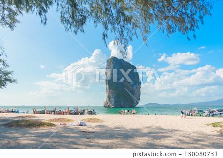 Tourists enjoy and sightseeing beautiful beach at Poda beach Island n Krabi, Thailand. Krabi, Thailand, 21 February 2025 130080731