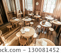 Traditional school classroom filled with wooden furniture and bright natural light 130081452