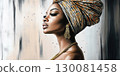 Portrait of an elegant African woman adorned with traditional accessories and a beautiful head wrap 130081458