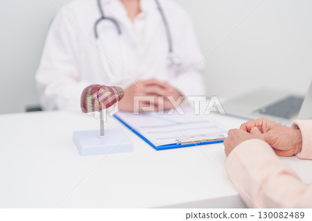 Doctor with human Liver anatomy. Elderly Patient consultation medical health for Liver cancer and Tumor, Jaundice, Viral Hepatitis, Cirrhosis, Failure, Enlarged, Hepatic Encephalopathy, Ascites Fluid 130082489