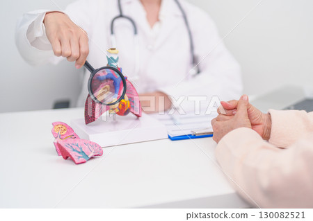 Doctor with Respiratory system. Elderly Patient consultation medical health for Lung Cancer, Asthma, Chronic Obstructive Pulmonary, Bronchitis, Emphysema, Cystic Fibrosis, Bronchiectasis, Pneumonia Doctor with Respiratory system. Elderly Patient consultation medical health for Lung Cancer, Asthma, Chronic Obstructive Pulmonary, Bronchitis, Emphysema, Cystic Fibrosis, Bronchiectasis, Pneumonia 130082521