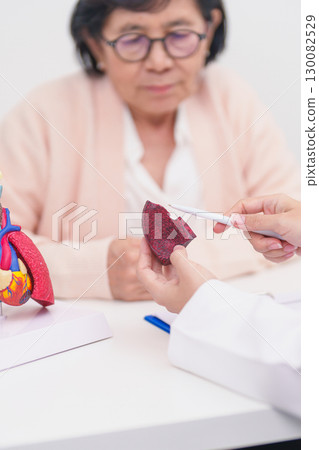 Doctor with Respiratory system. Elderly Patient consultation medical health for Lung Cancer, Asthma, Chronic Obstructive Pulmonary, Bronchitis, Emphysema, Cystic Fibrosis, Bronchiectasis, Pneumonia Doctor with Respiratory system. Elderly Patient consultation medical health for Lung Cancer, Asthma, Chronic Obstructive Pulmonary, Bronchitis, Emphysema, Cystic Fibrosis, Bronchiectasis, Pneumonia 130082529