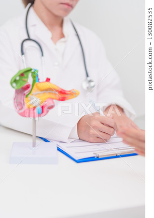 Elderly Patient consultation with doctor for Pancreas, Gallbladder, Bile Duct, Duodenum, Small intestine. Pancreatic cancer, Acute and Chronic pancreatitis, Digestive system and medical healthcare 130082535