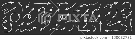 Arrow drawn hand vector line icon set. Hand drawn brush chalk stroke arrow curve, thin pencil scribble shape with vintage charcoal crayon texture. Doodle up down arrow symbol. Vector Arrow drawn hand vector line icon set. Hand drawn brush chalk stroke arrow curve, thin pencil scribble shape with vintage charcoal crayon texture. Doodle up down arrow symbol. Vector 130082781
