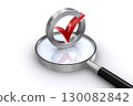 Check mark and magnifying glass 130082842